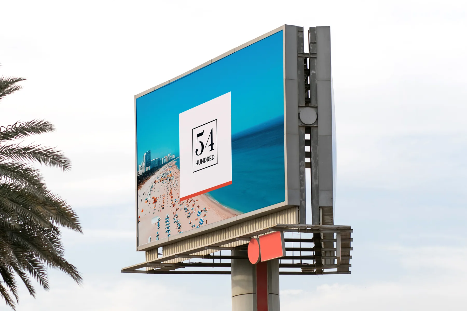 54 Hundred billboard concept above a Miami street with the framed mark over beach photography